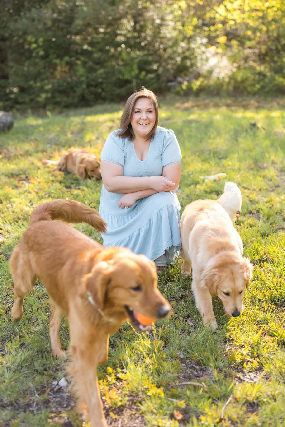 Tammy with her Golden Retrievers in the Adirondacks